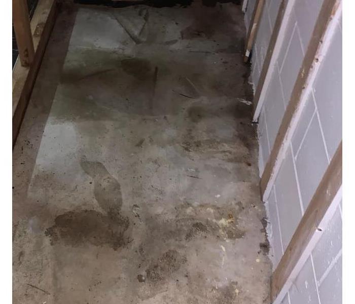 Water cleaned from under the stairs
