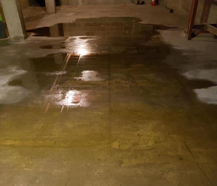 water after a storm in basement of a local business